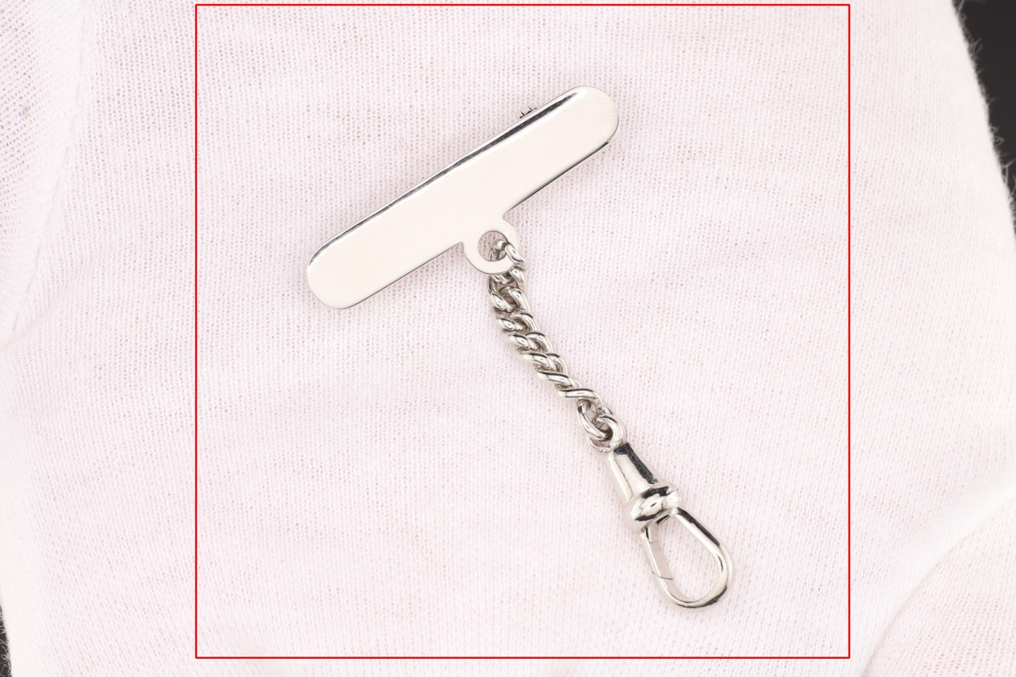 Brosche zu Schwesternuhr