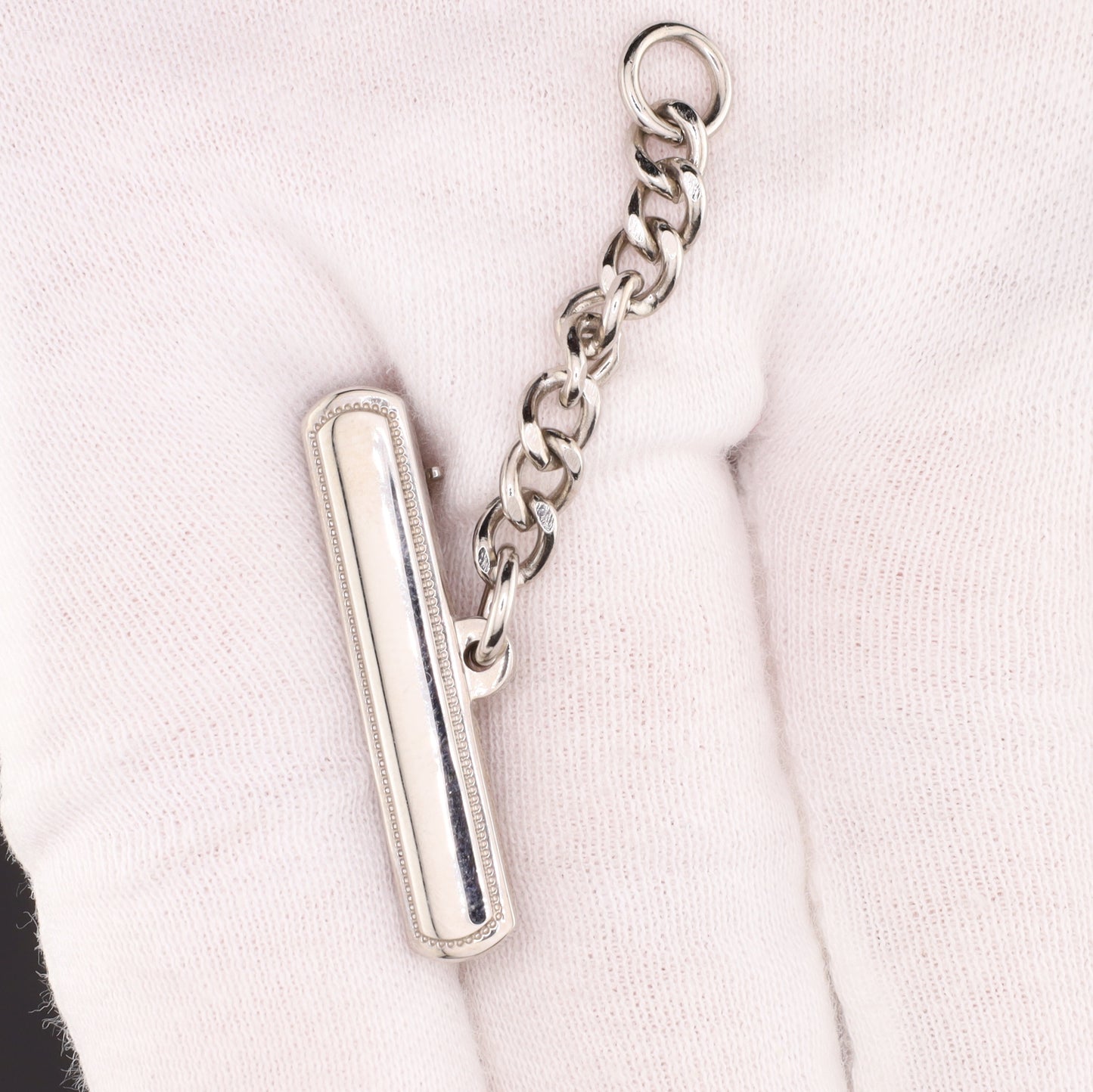 Brosche zu Schwesternuhr