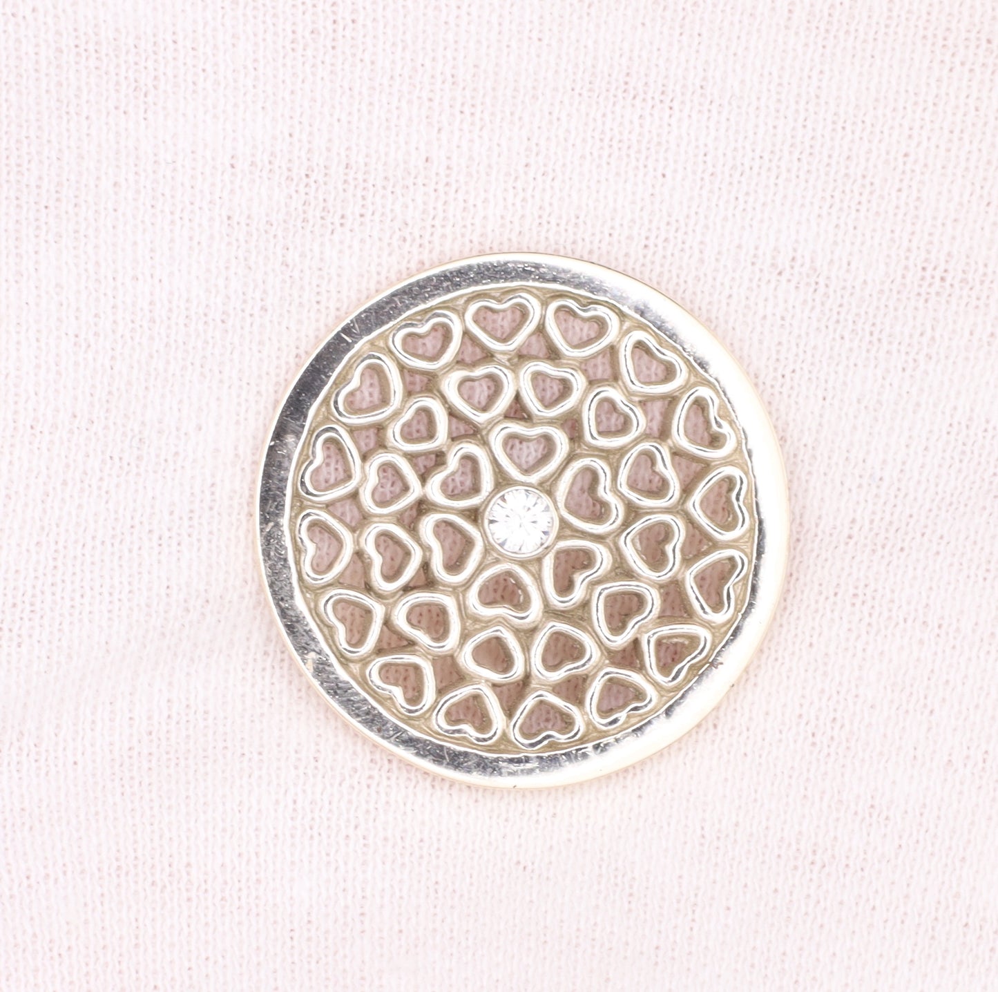 Münze mit Stein(en)